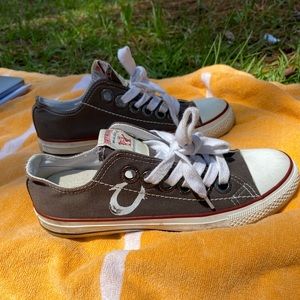 True Religion low top sneaks! Looks exactly as pictured. Worn once! No return